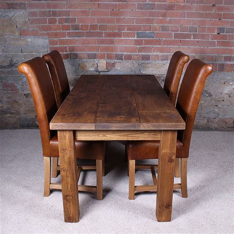 solid wood dining table by h&f | notonthehighstreet.com