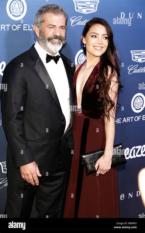 Mel Gibson and his girlfriend Rosalind Ross attending The Art of ...