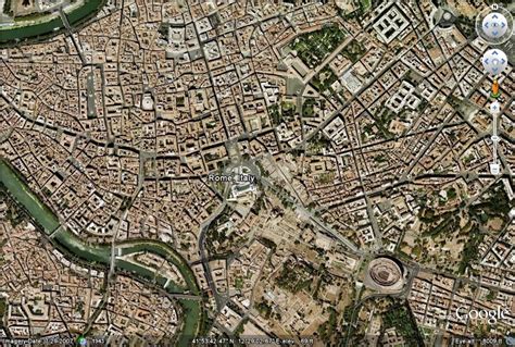 Aerial view of Rome - the Colosseum distinct in the lower right corner | Ciel