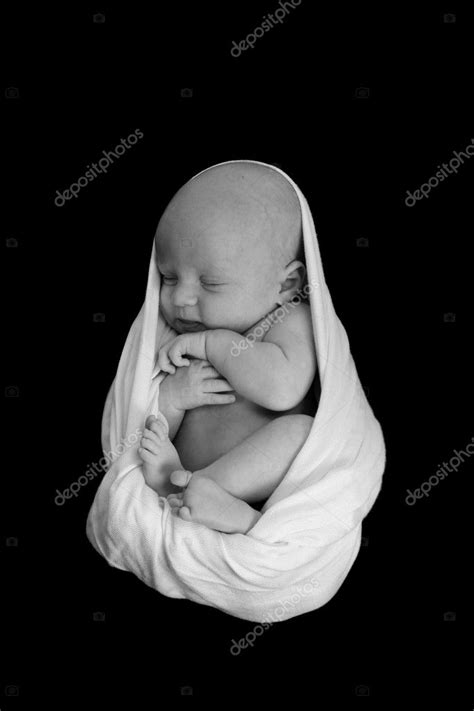 A Newborn Baby Swaddled in a Blanket Sleeping So — Stock Photo © tobkatrina #2815894