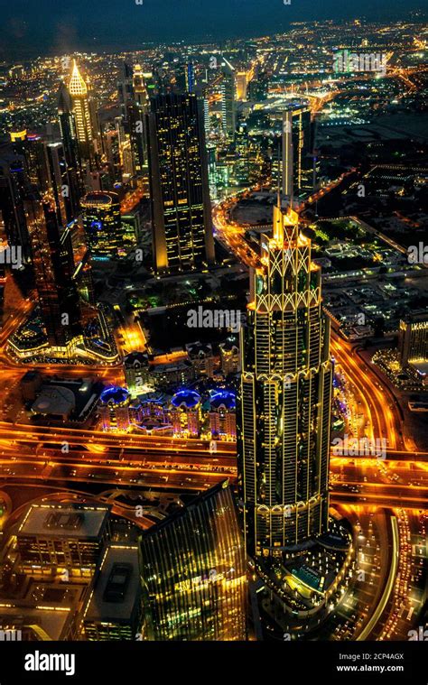 A night view of Dubai from the observation deck of the Burj Khalifa tower in Dubai, United Arab ...