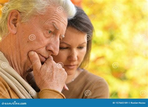 Portrait of Sad Woman and Senior Man Hugging Stock Image - Image of unhappy, emotions: 157665189