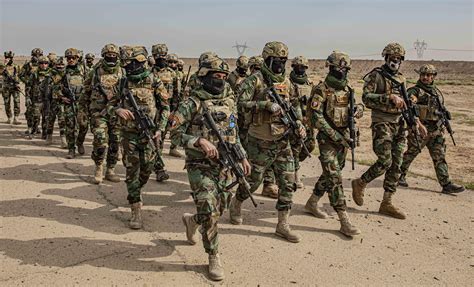 Iraqi Special Operations Forces (ISOF) members during a training exercise. These operators ...