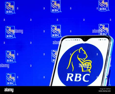 In this photo illustration a Royal Bank of Canada logo is seen ...