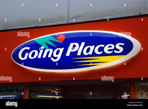 Going Places travel agents shop sign, UK Stock Photo - Alamy