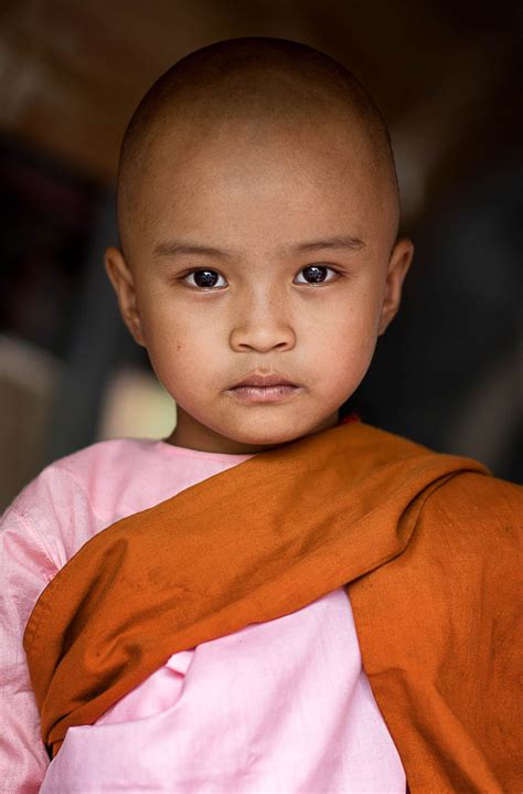 Novice nun wearing pink and orange robes in Yangon, Myanmar. Kids ...