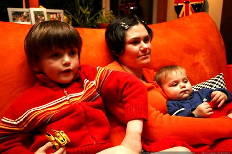 photo: mother and sons curled up on the couch, watching a movie MG 5973 ...