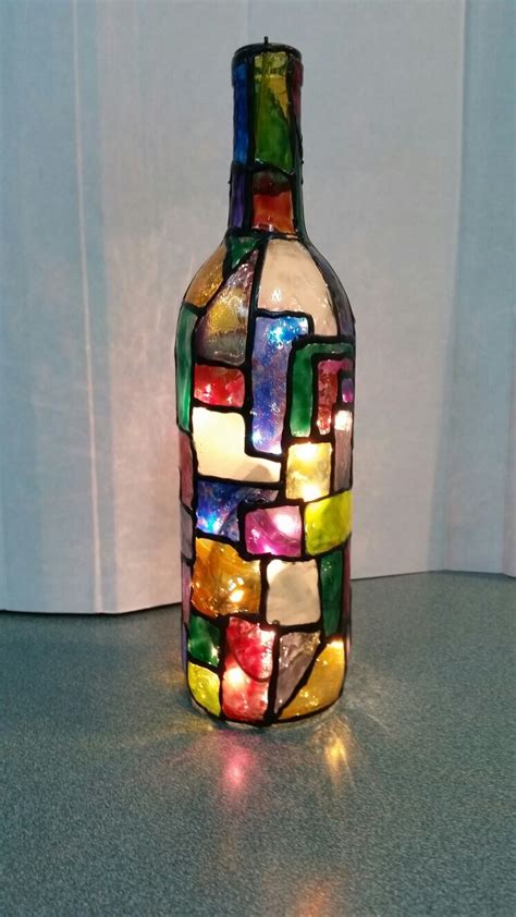 Stained glass look with lights. | Painted wine bottles, Painted glass ...