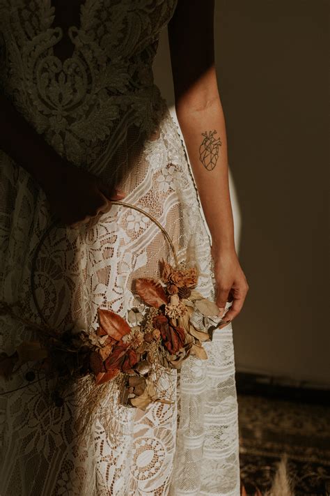 Woman Wearing White Lace Dress Holding Wreath · Free Stock Photo