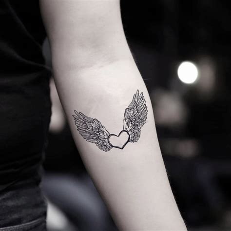 Angel Wings Tattoo With Heart