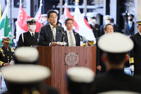 Japan PM pledges to boost military capacity