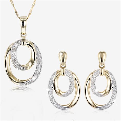 9ct Gold Diamond Necklace and Earrings Set at Warren James