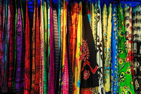 Premium Photo | Multicolored saris at the street market