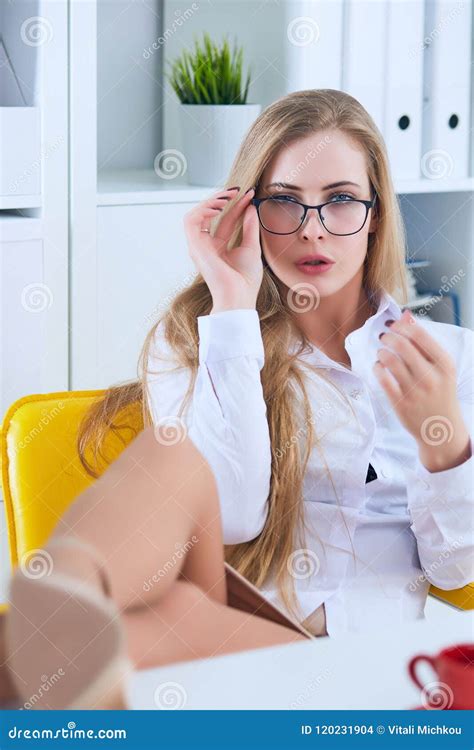 Office Flirt - Attractive Woman Flirting Over Desk with Her Coworker or Boss. Stock Photo ...