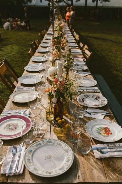 Farm Tables With Vintage Plates, Glasses | Vintage wedding table, Wedding table settings, Table ...