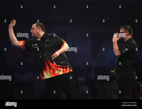 Ryan Joyce )left) during the William Hill World Darts Championship ...