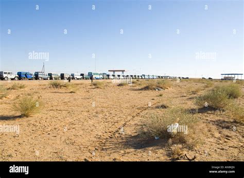 Mongolia zamyn uud border crossing into china view with vehicle queuing ...