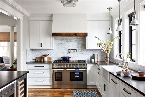 This kitchen continues with the wow factor. The edgy marble backsplash ...