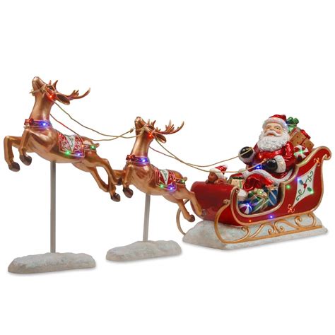 Get the Reindeer Pulling Santa & Sleigh Decoration at Michaels