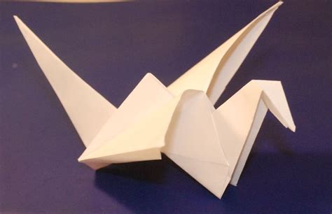 How to Make an Origami Flying Bird | Origami, Birds flying, Flapping bird