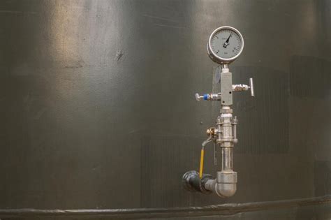 Premium Photo | Pressure gauge of pump and receiver tank of air compressor