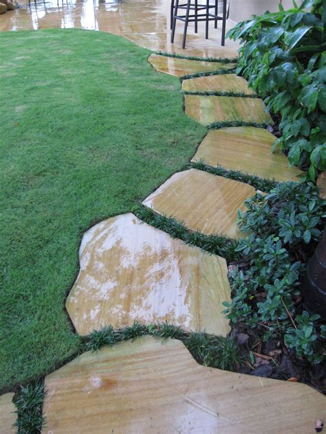 Stepping stone walkway by Waterfalls Fountains & Gardens Inc. | Stone walkway, Stepping stone ...