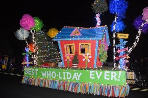 Lessard Builders' float has a Dr. Seuss theme with the Grinch not far ...