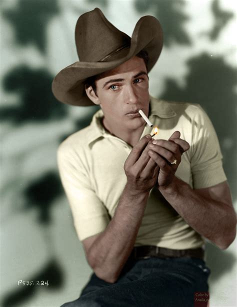 Actor Gary Cooper in the silent western movie "Wolf Song", 1929 : r/Colorization