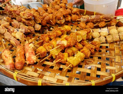 deep fried savoury snacks in batter , street snacks , bangkok, thailand ...