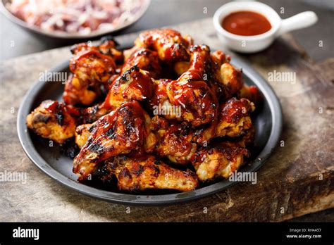 Barbecue chicken wings with sauce Stock Photo - Alamy