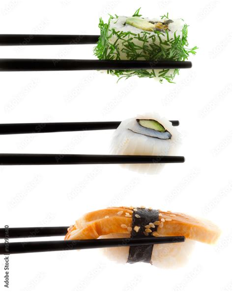 Sushi with chopsticks shot on white. Stock Photo | Adobe Stock