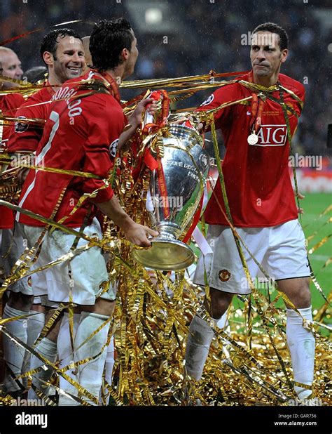 Manchester uniteds rio ferdinand with the champions league trophy hi-res stock photography and ...