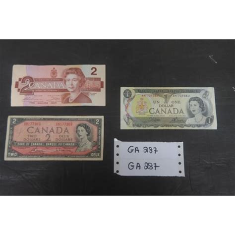 Vintage Canadian Paper Money; 1973- $1, 1986 -$2, 1954 - $2 - McSherry Auction Service Ltd.