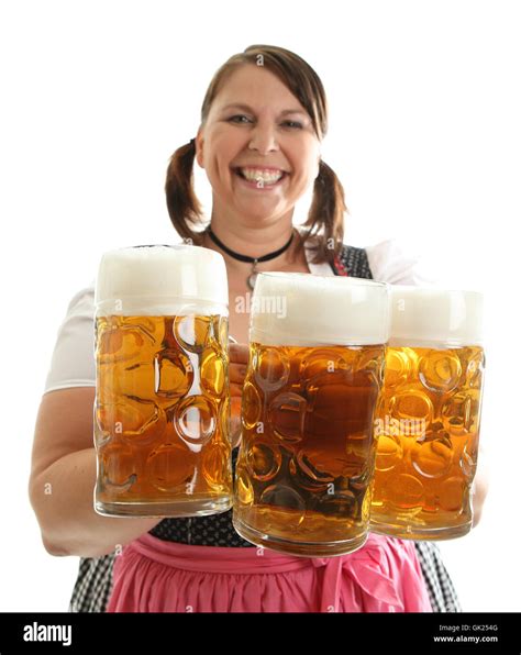 oktoberfest beer mugs with operator Stock Photo - Alamy