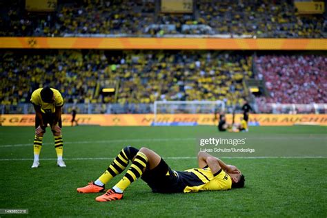 Jude Bellingham of Borussia Dortmund reacts after loosing their match ...