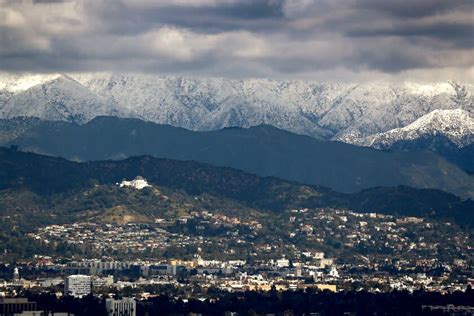 Before and after photos from space show epic snow blanketing SoCal mountains