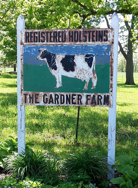 Tin farm sign