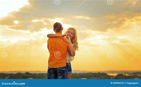 Loving Couple Hugging at Sunset. Stock Photo - Image of affection, male ...