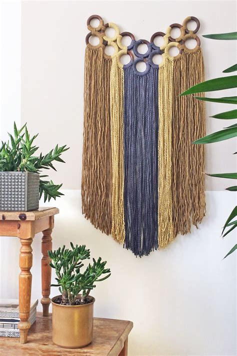 Macrame wall hanging with yarn wrapped wooden curtain rings | Etsy | Diy wall hanging yarn ...