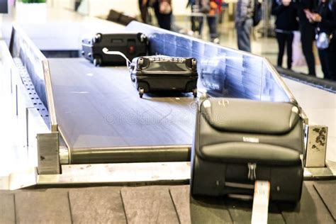 Baggage Luggage on Conveyor Carousel Belt at Airport Arrival Stock Photo - Image of damaged ...