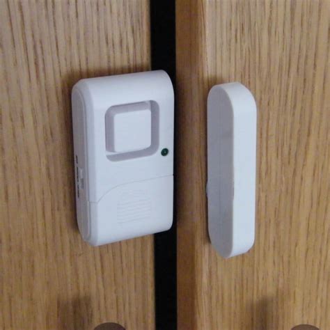Alarm System For Door Opening