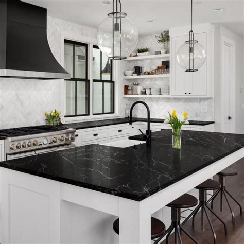 black kitchen cabinets with white marble countertops - vipond-roegner-99