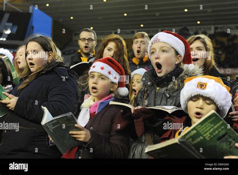 Choir singing Christmas Carols St Peter's Collegiate Church choir Stock ...