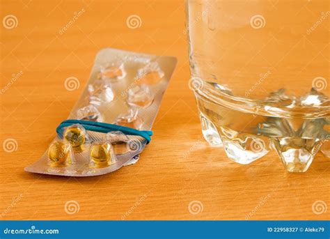 Tablets with water stock image. Image of pills, glass - 22958327