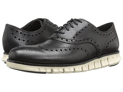 Cole Haan Zerogrand Wing Ox (Black Closed Holes/White) Men's Lace Up Wing Tip Shoes. Blend the ...