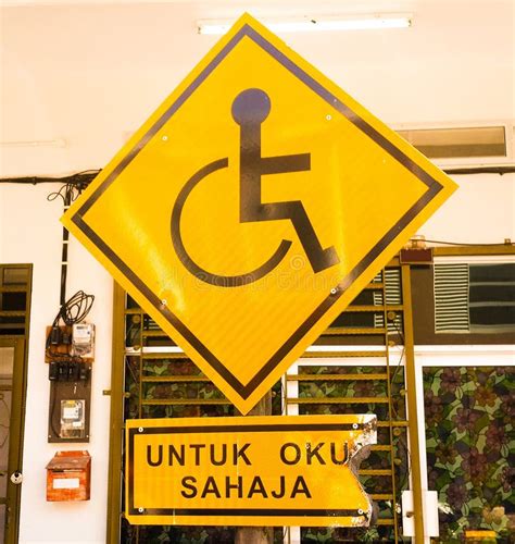 Burning of Reserved Parking for Handicapped only Sign with Malaysian Language `parking for ...