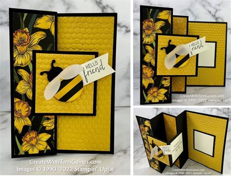 the inside of a card with yellow flowers and black border, which has a bee on it