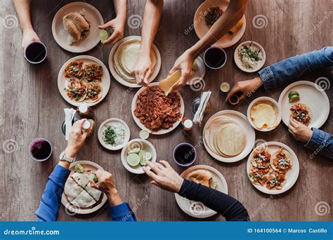 Tacos Al Pastor, Group of Mexican People Eating in a Taqueria in Mexico ...