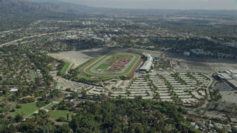 8K stock footage aerial video approaching the Santa Anita Park horse ...