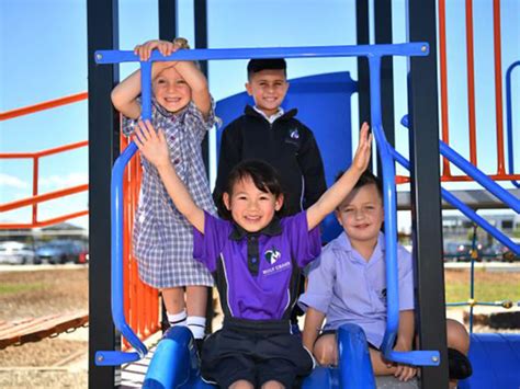 Lucky students reveal uniform for Mickleham’s newest primary school | Holy Cross Catholic ...